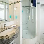 酒店 Strandhotel Kurhaus 4*